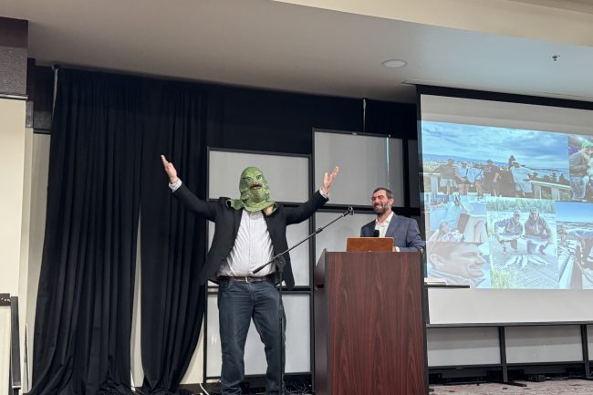 Johnathan Blakey presents Sean Nepper with the USTFA Ugly Trout Farmer Award